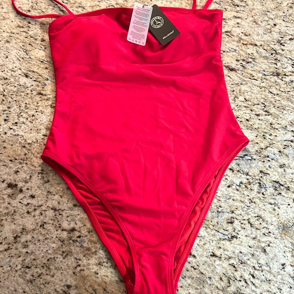 RELLECIGA women’s one piece bandeau neckline swim suit. NWT. Red size small.